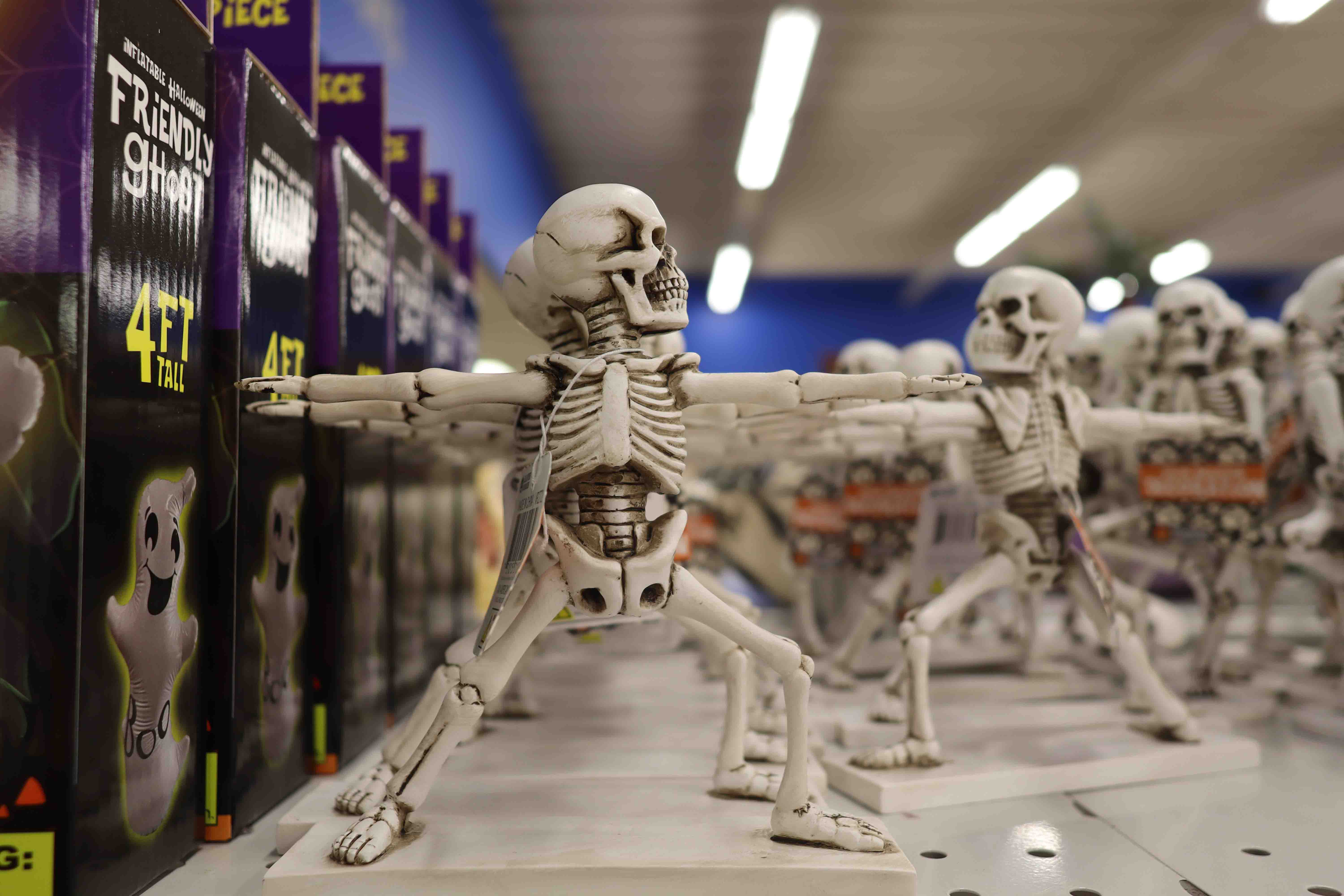 Decoration of skeletons doing yoga poses.